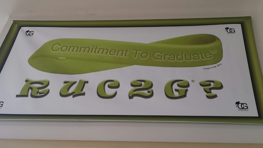 Students receive a green wristband when they sign their commitment to graduate. 