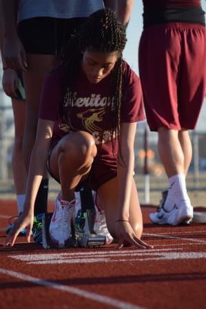  During track practice on February 11, sophomore Aakilah Clark prepares for her hurdle starts. The girls track team begins their season with a tri-meet this Thursday.