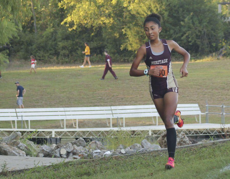 On Sept. 17 at Wylie, sophomore Alyssa Duhart competes and places first in the cross country meet. Alyssa was inspired to go into cross country after seeing her older sister place at the state competition.