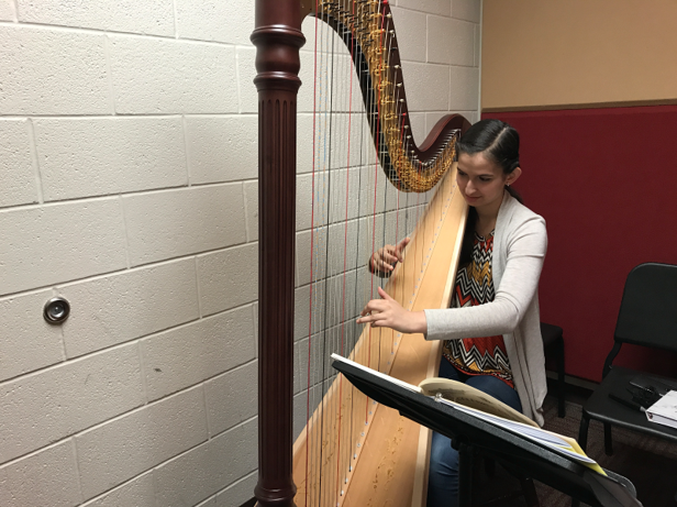 Harpist+Paulina+Delgadillo+is+in+her+final+year+of+high+school+after+being+a+part+of+the+Heritage+orchestra+since+seventh+grade.