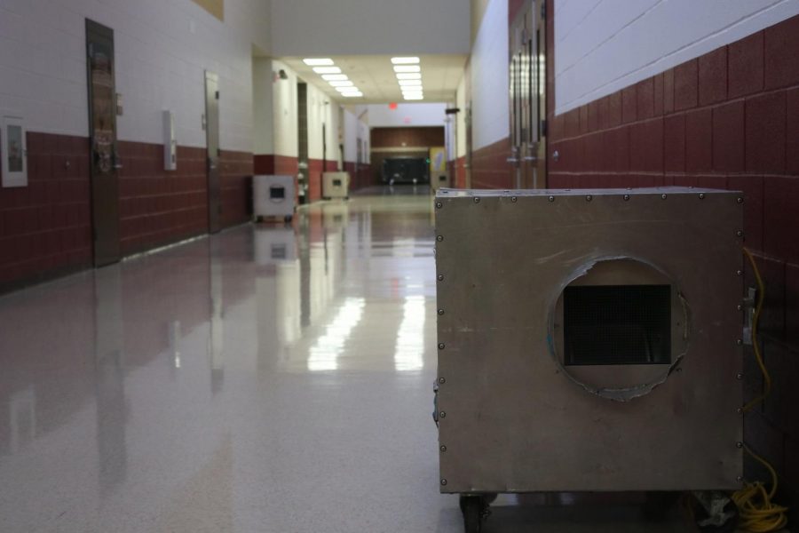 A district-hired restoration company started cleaning up Saturday evening by putting “scrubbers,” machines that filter out the air, around the school. The machines were removed from the hallways Tuesday evening, Sept. 11.